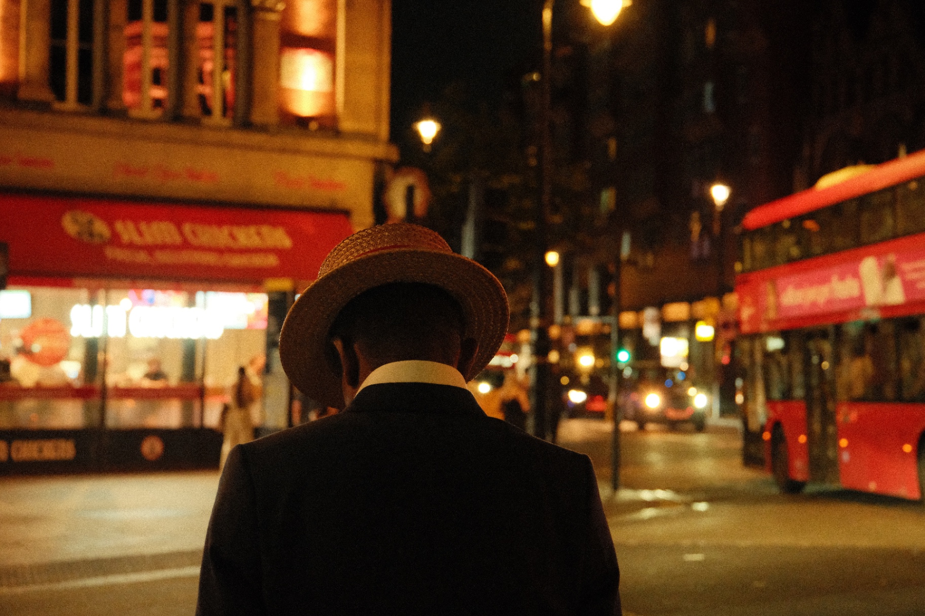Straw hat, red bus, LONDON, 2026